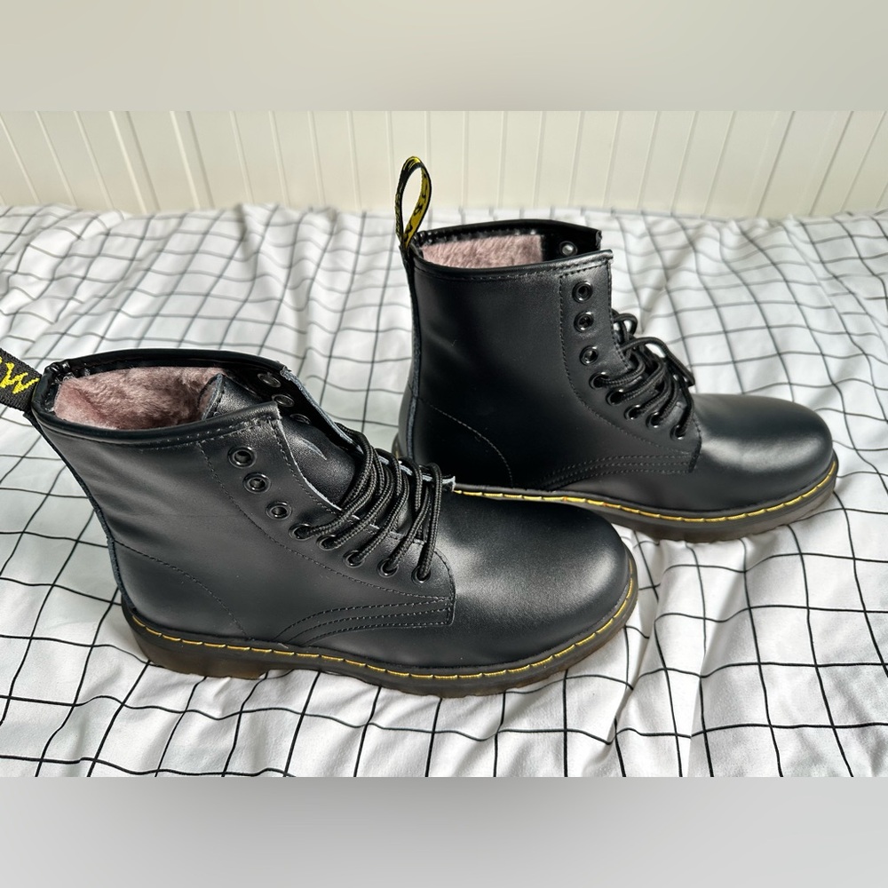 Black lace up combat style boots
